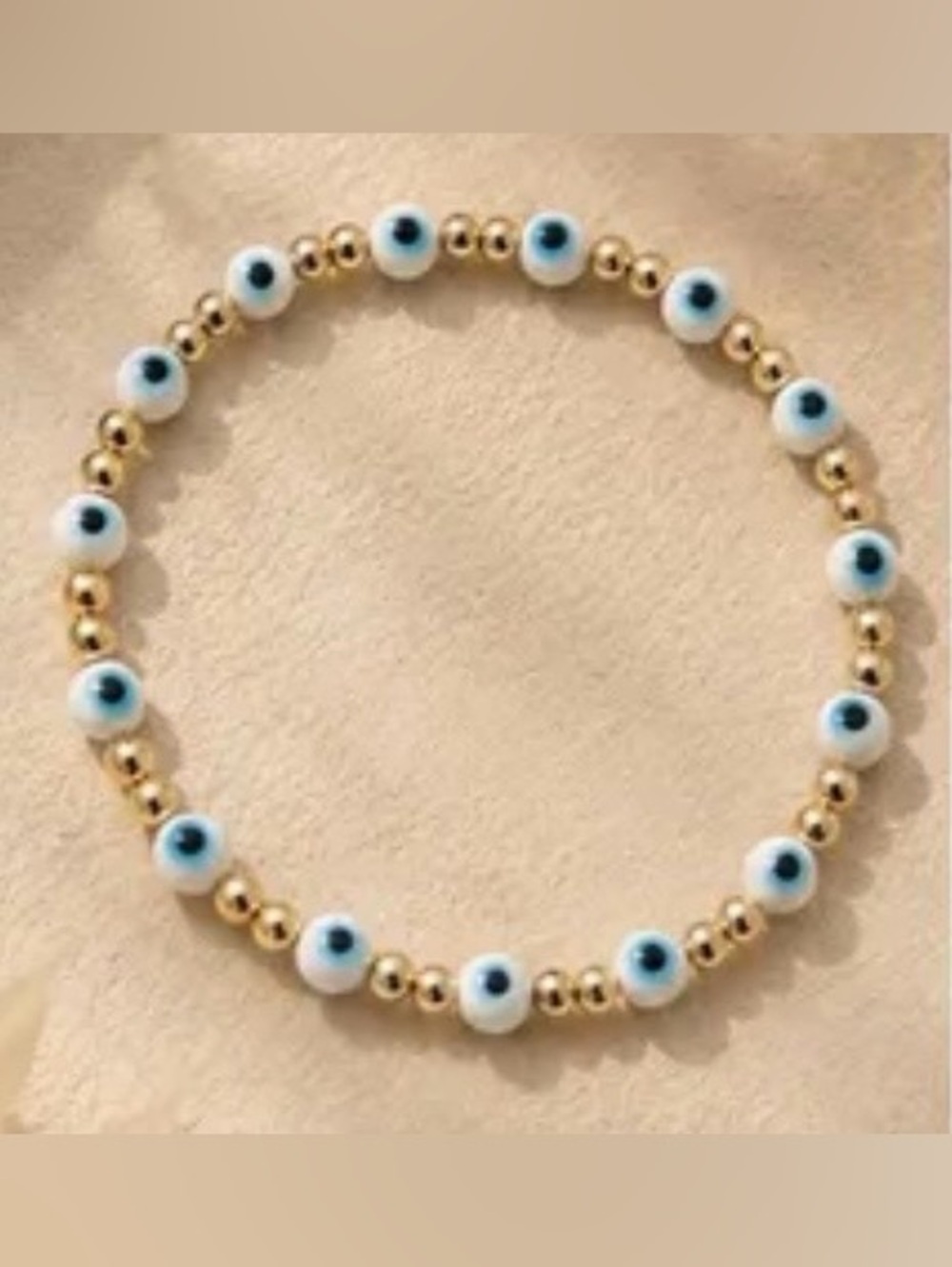 Gold Bead Stretch Bracelet with Blue & White Evil Eye Accents